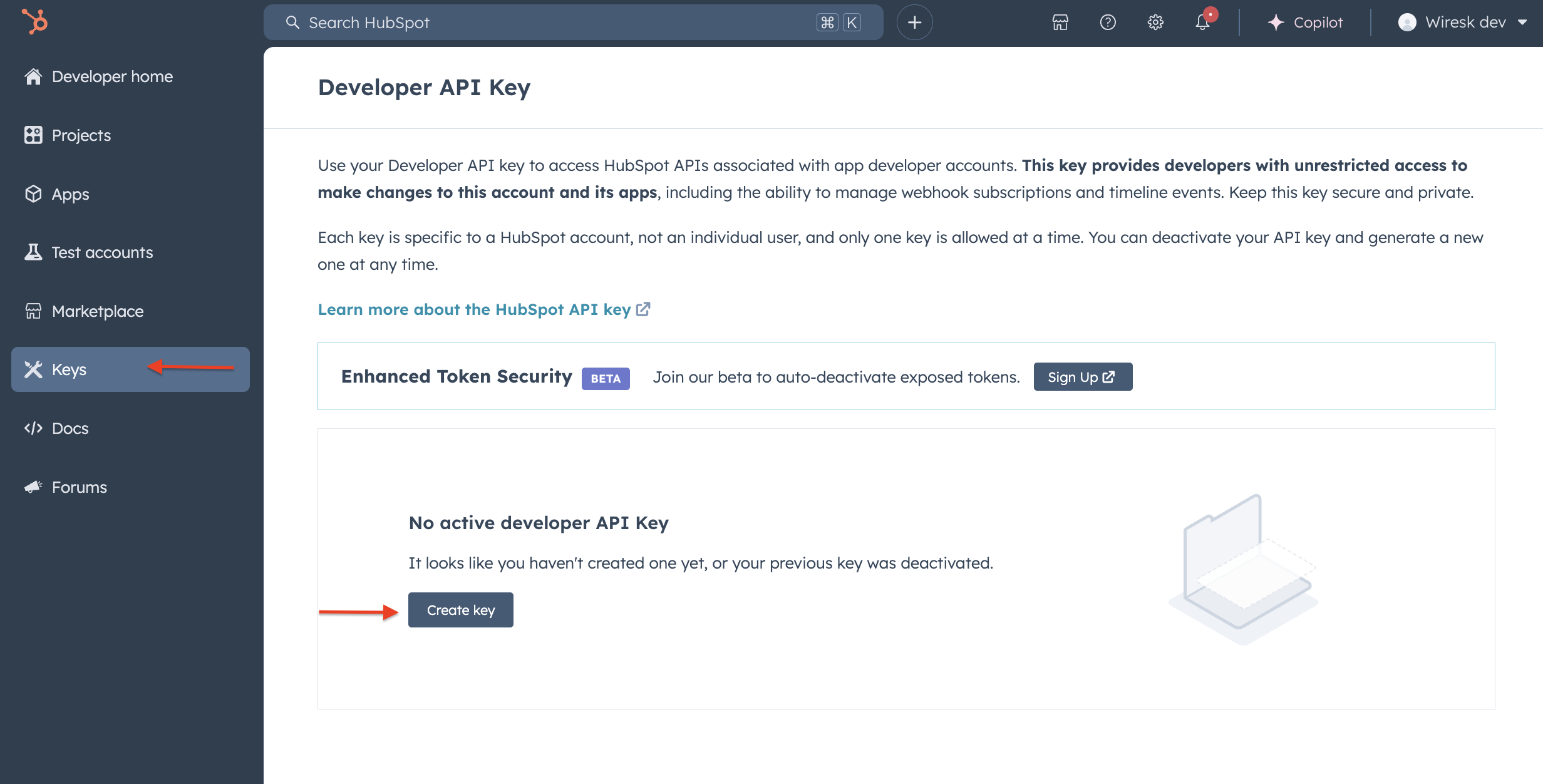 Screenshot of HubSpot Dev API key Page. Red arrows point to Keys tab on the left panel, and point to Create key button.