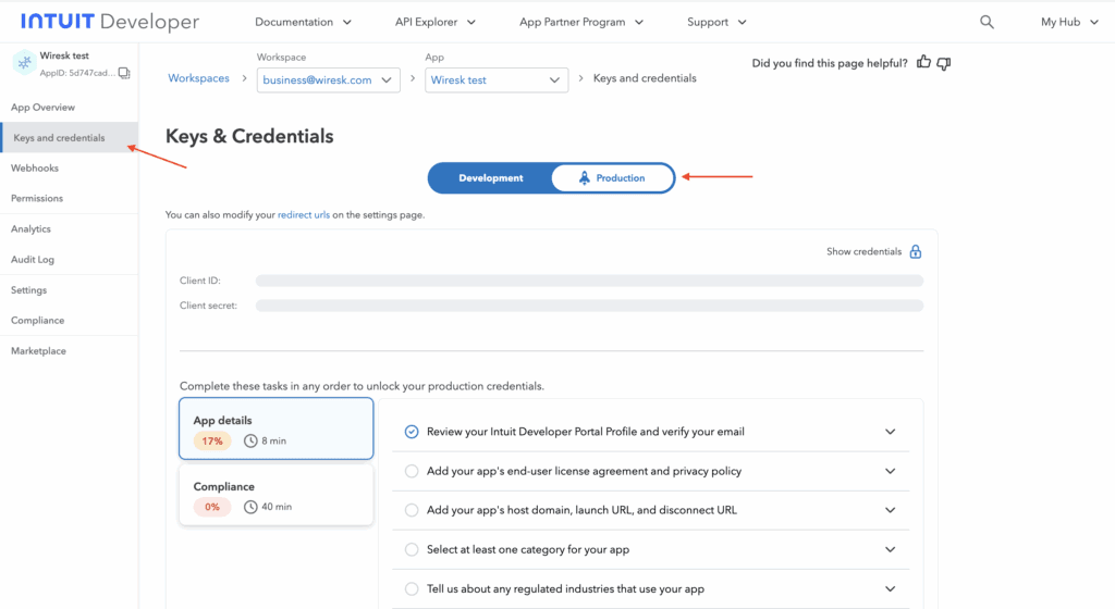 Screenshot of QuickBooks developer account. It Shows red arrows pointing to keys and credentials section and production button to get the production credentials.