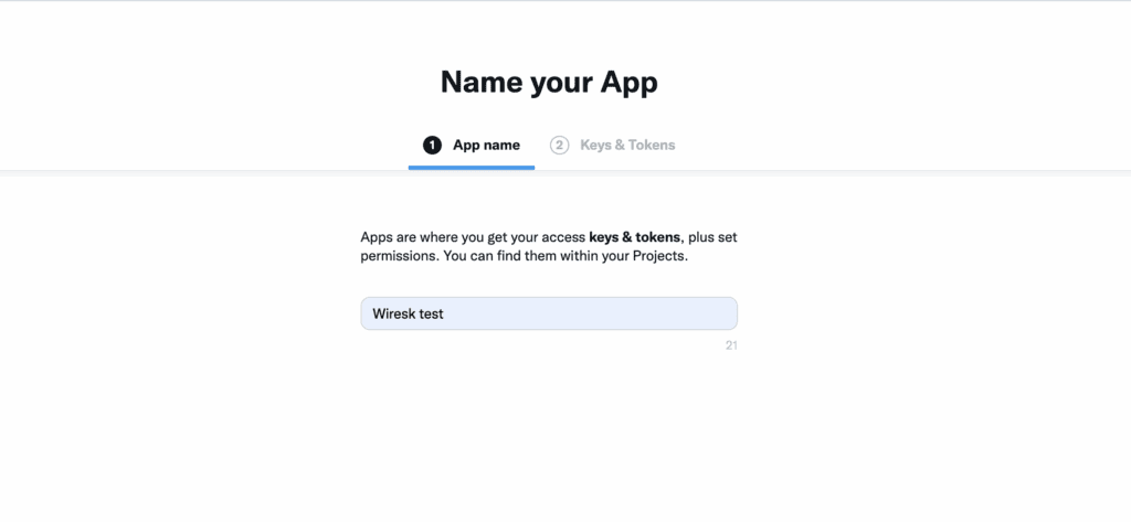 “Name your App” screen in the X Developer Portal with a text field filled with “Wiresk test” and navigation showing step 1 of 2 (App name).