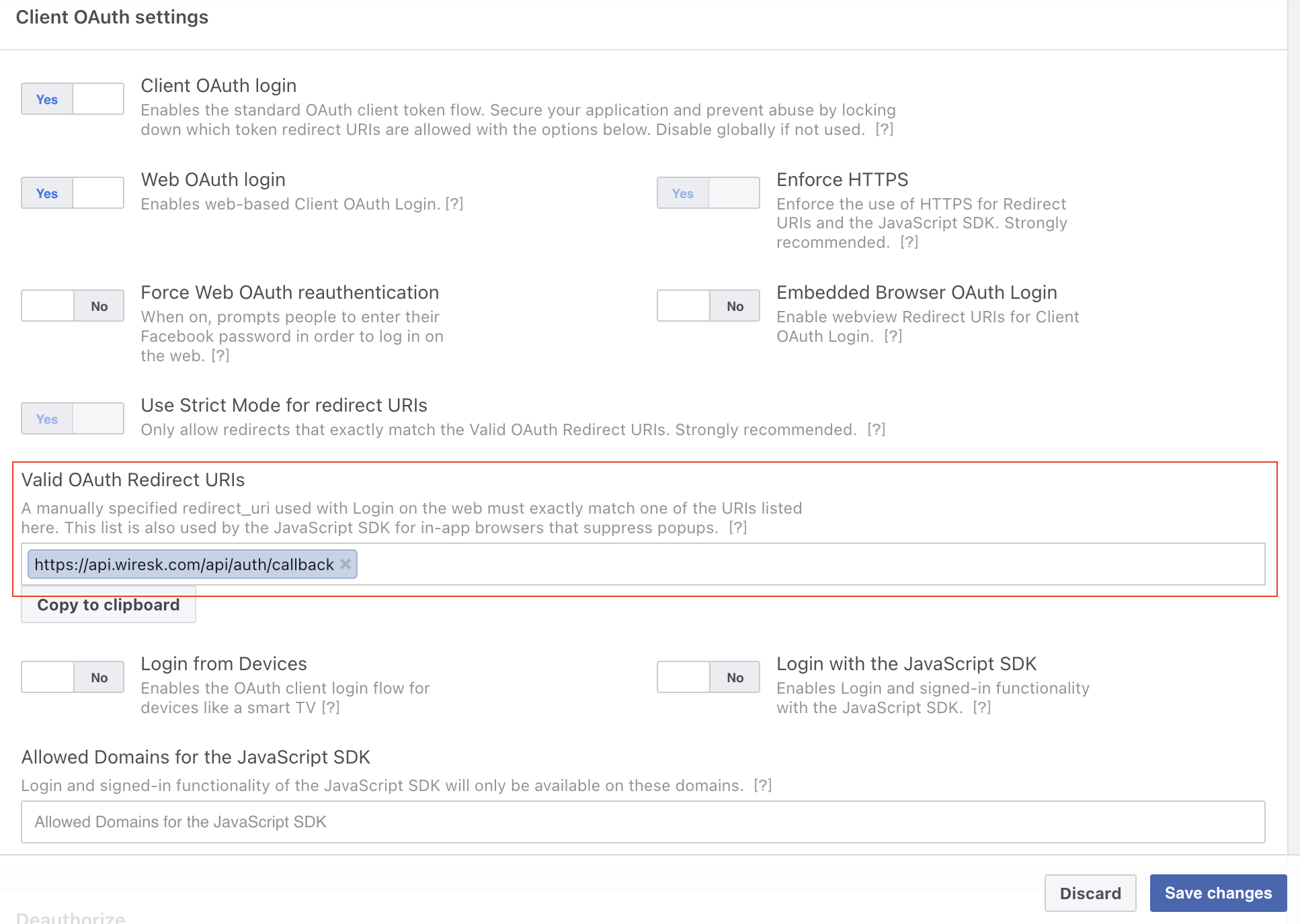 Meta Developer portal showing the "Client OAuth settings" section. Several toggle options are enabled, including "Client OAuth login," "Web OAuth login," "Enforce HTTPS," and "Use Strict Mode for redirect URIs." The "Valid OAuth Redirect URIs" field is populated with https://api.wiresk.com/api/auth/callback, indicating the URI where users will be redirected after authentication. Options like "Login from Devices" and "Login with the JavaScript SDK" are disabled. At the bottom, there are "Discard" and "Save changes" buttons.