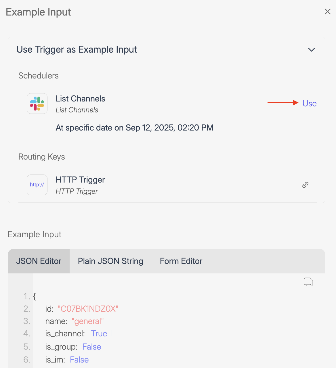 Screenshot of Wiresk Example Input panel showing the option "Use Trigger as Example Input." The panel lists available schedulers such as List Channels with a scheduled date, and an HTTP Trigger under Routing Keys. A "Use" link is highlighted, allowing users to import example data from the selected trigger. Below, the JSON Editor displays sample JSON fields including id, name, and is_channel.